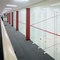 Racquetball, handball and squash court glass walls wood flooring courts